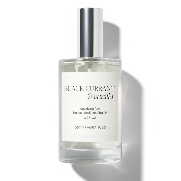 100ml bottle of Black Currant Vanilla Eau de Parfum by DST Fragrances against a white background.
