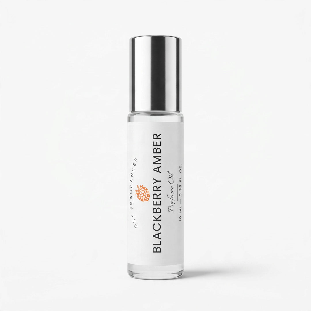 A clear glass bottle of essential oil with a reflective silver cap and a white label reading &