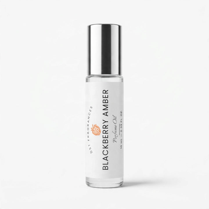 A clear glass bottle of essential oil with a reflective silver cap and a white label reading &