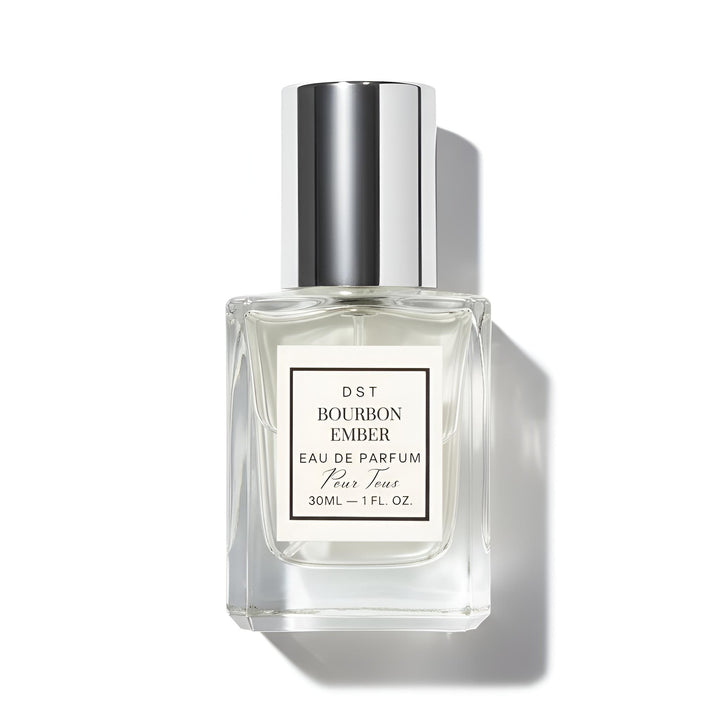 Perfume bottle labeled 'Bourbon Ember' by DST on a white background