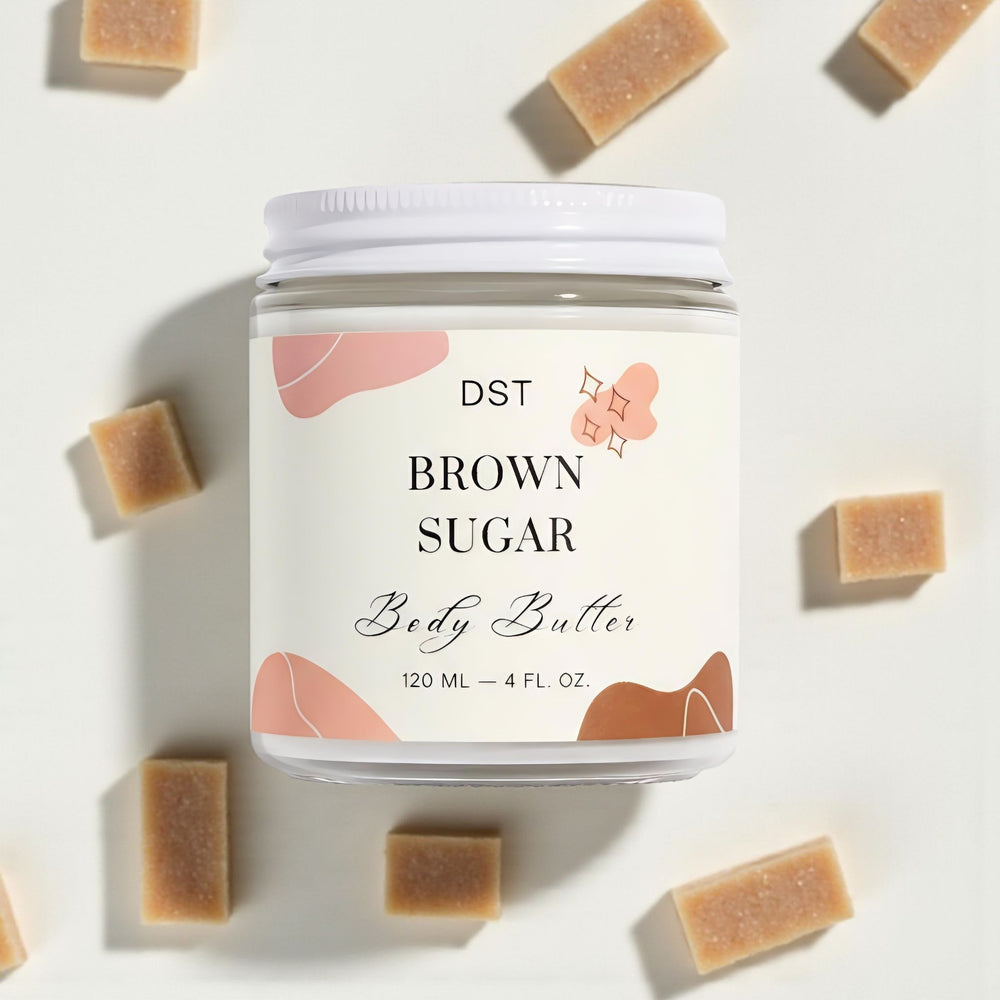 Jar of brown sugar body butter with a decorative label on a light background