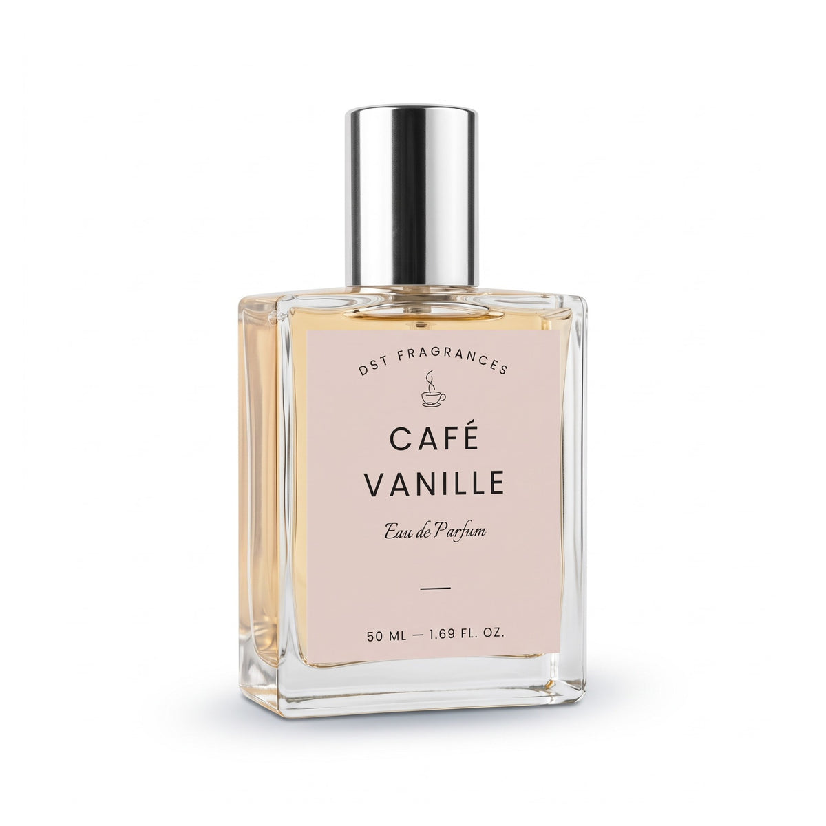 A rectangular glass perfume bottle with a silver cap, filled with light amber liquid and featuring a pale blush pink label that reads 'CAFÉ VANILLE' and '50 ML — 1.69 FL.