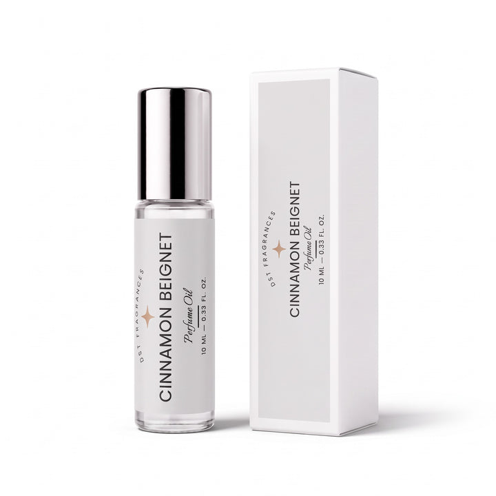 10ml roll on bottle of Cinnamon Beignet Perfume Oil by DST Fragrances and the box it is packaged in.