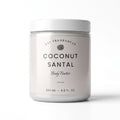 A white plastic jar of DST Fragrances Coconut Santal Body Butter on a clean white background.