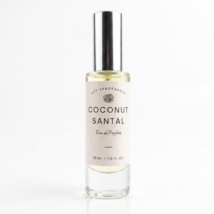 A 30 ml clear glass bottle of Coconut Santal Eau de Parfum by Est Fragrances, featuring a white label and a reflective silver cap, set against a plain white background.