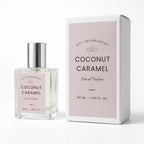 A 50 ml bottle of DST Fragrances Coconut Caramel Eau de Parfum next to its white and pale pink packaging box, set against a clean white background.