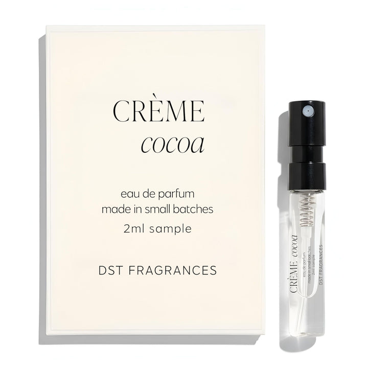 2ml sample spray vial of Creme Cocoa Eau de Parfum by DST Fragrances against a white background.