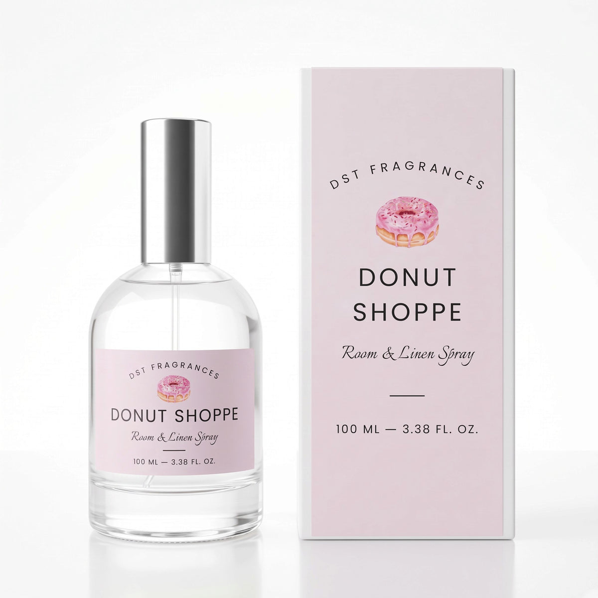 100ml bottle of Donut Shoppe Linen Spray and its box by DST Fragrances against a white background.