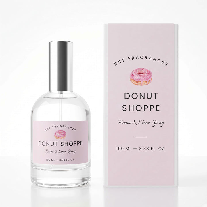 100ml bottle of Donut Shoppe Linen Spray and its box by DST Fragrances against a white background.