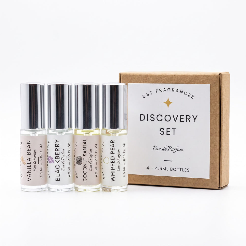 4 4.5ml perfume oil roll-on bottles by DST Fragrances and the box it is packaged in. 