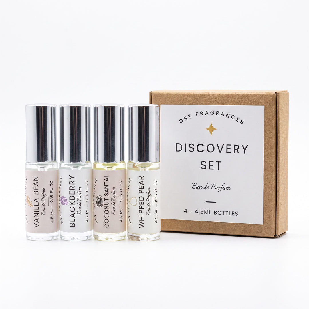 4 4.5ml perfume oil roll-on bottles by DST Fragrances and the box it is packaged in. 