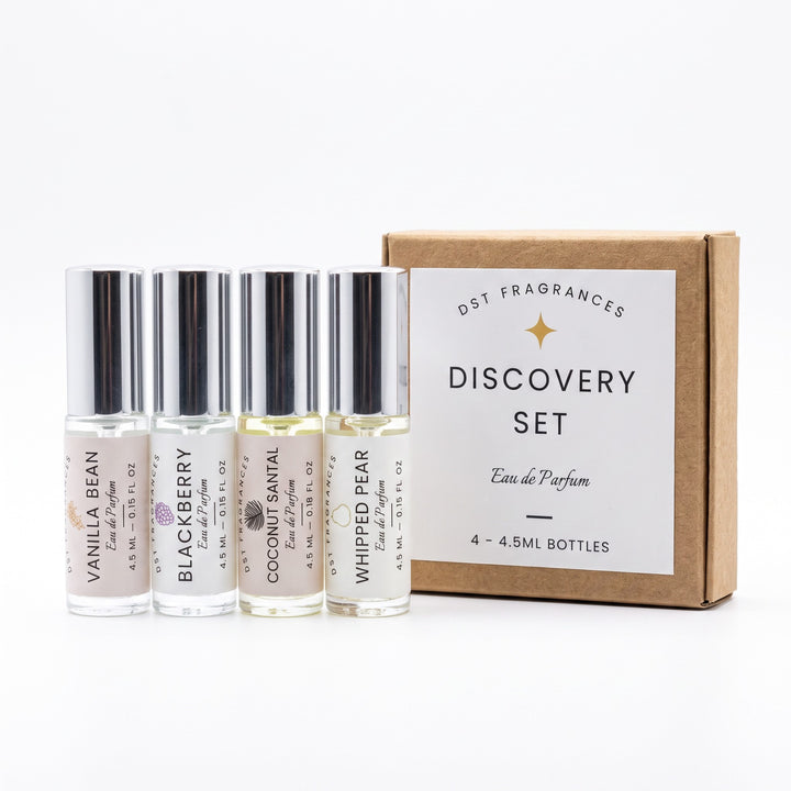 4 4.5ml perfume oil roll-on bottles by DST Fragrances and the box it is packaged in. 