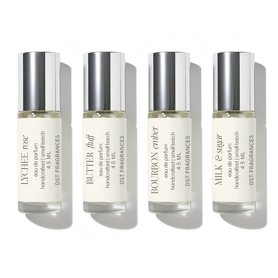 4 bottles of 4.5ml sample size eau de parfum sprays by dst fragrances on a white background.