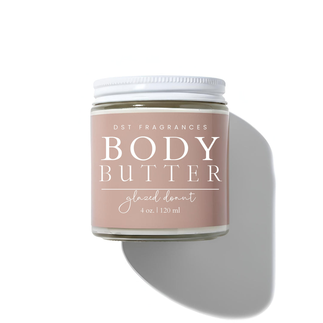 Jar of body butter with a pink label on a white background