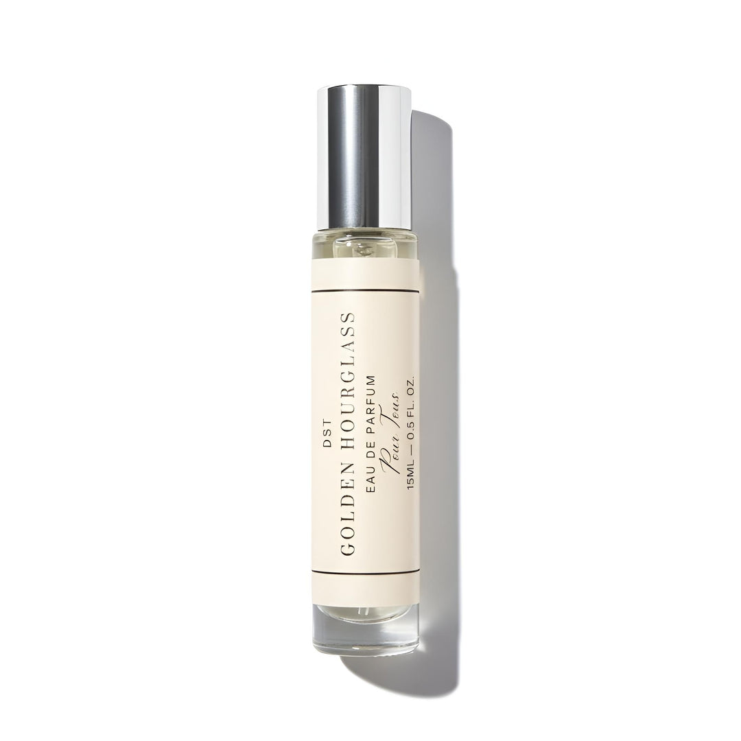 Perfume bottle with 'Golden Hourglass' label on a white background
