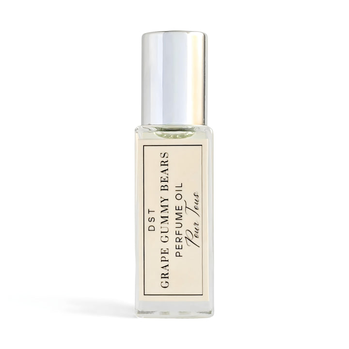 Perfume oil bottle with a white label on a white background