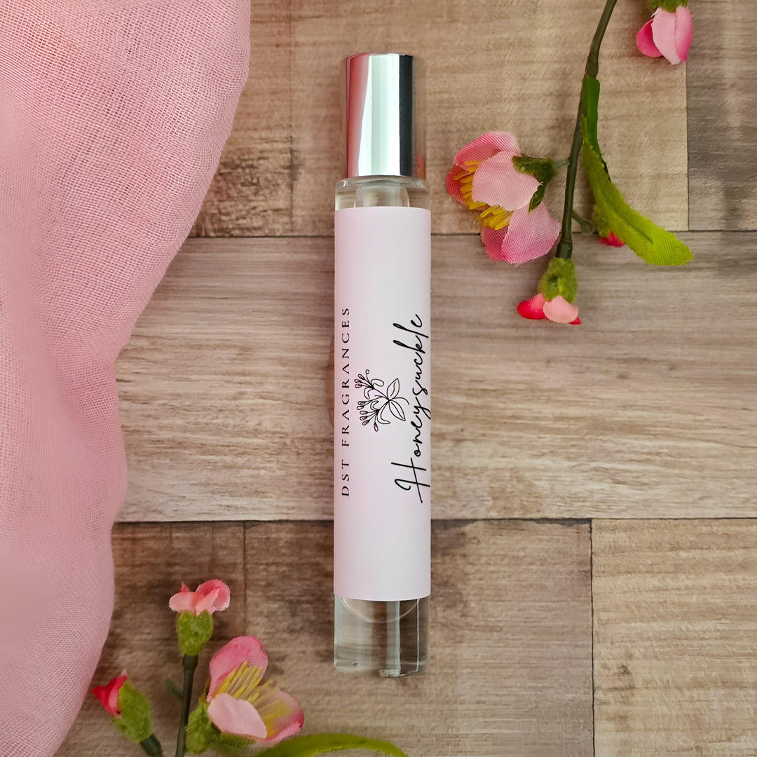 10ml bottle of Honeysuckle perfume oil against a grey background. 