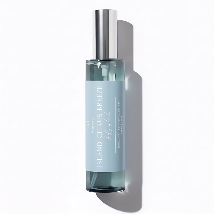 100ml bottle of Island citrus breeze body splash by DST Fragrances on a white background.