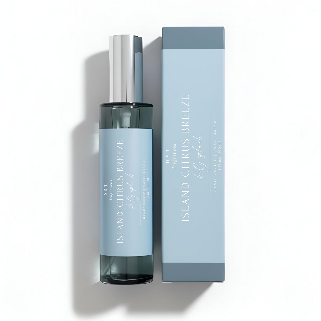 100ml bottle of Island citrus breeze body splash and its box by DST Fragrances on a white background.