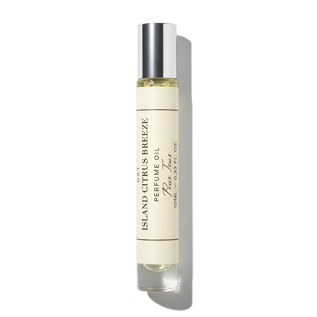 Perfume oil bottle labeled 'Island Citrus Breeze' on a white background