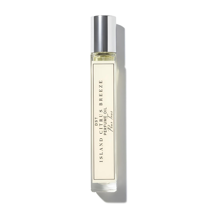 Perfume bottle labeled 'Island Citrus Breeze' on a white background