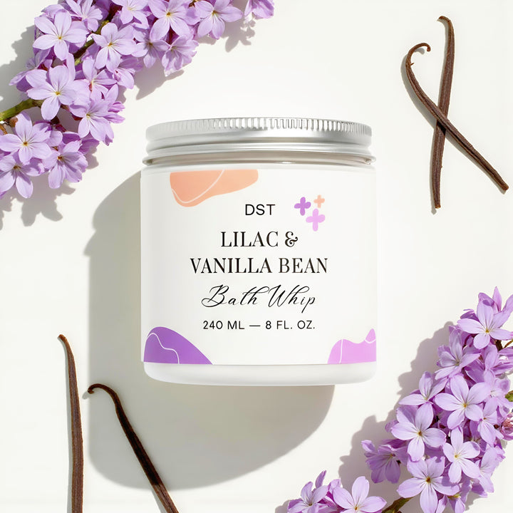 Bath whip container labeled 'Lilac & Vanilla Bean' with lilac flowers and vanilla beans on a white background