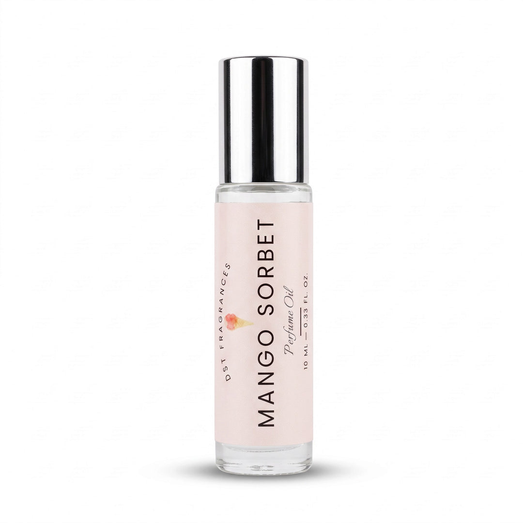 A 10 ml glass rollerball bottle of Mango Sorbet Perfume Oil by Dst. Fragrances, featuring a light pink label and a reflective silver cap, set against a plain white background.