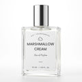 A 50 ml clear glass perfume bottle with a silver cap and a white label reading 'MARSHMALLOW CREAM' by DST Fragrances, on a white background.