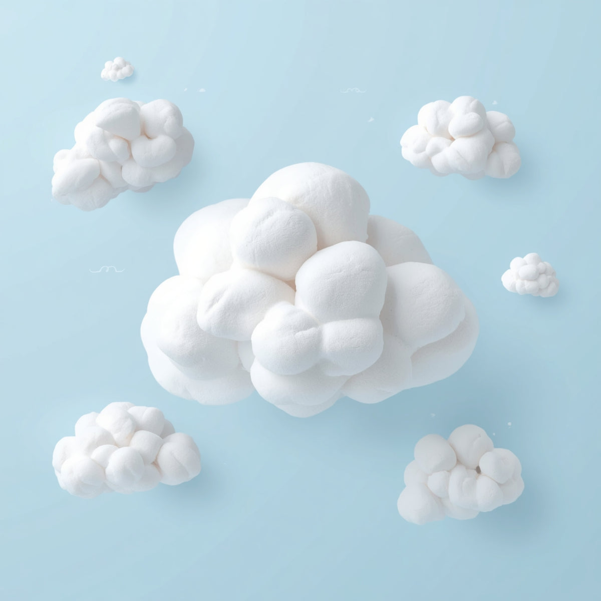 White fluffy cloud-shaped marshmallows arranged on a light blue background, with one large cloud in the center and four smaller clouds around it.