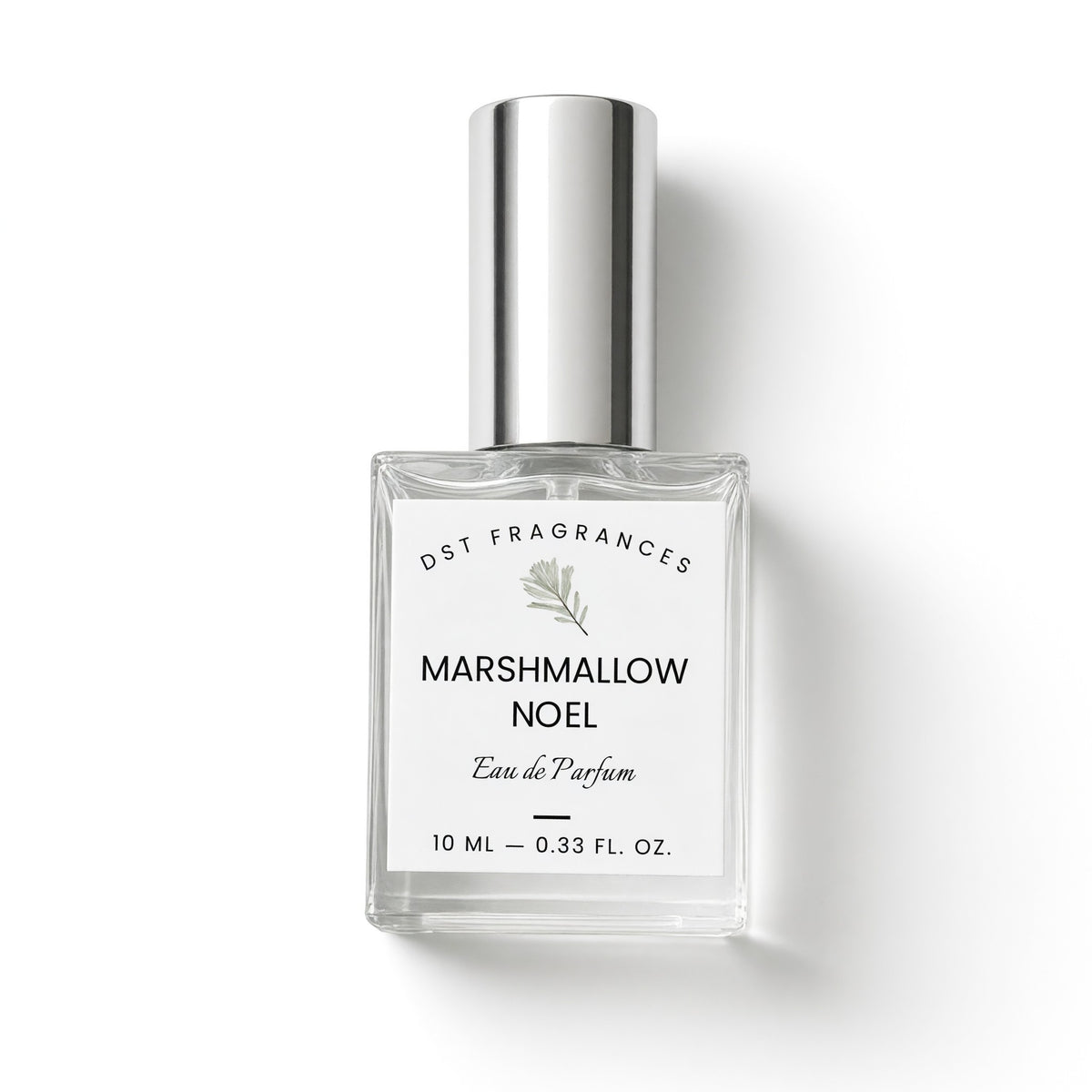 A 10 ml clear glass bottle of DST Fragrances 'Marshmallow Noel' Eau de Parfum with a silver cap and white label, set against a clean white background with a soft shadow.