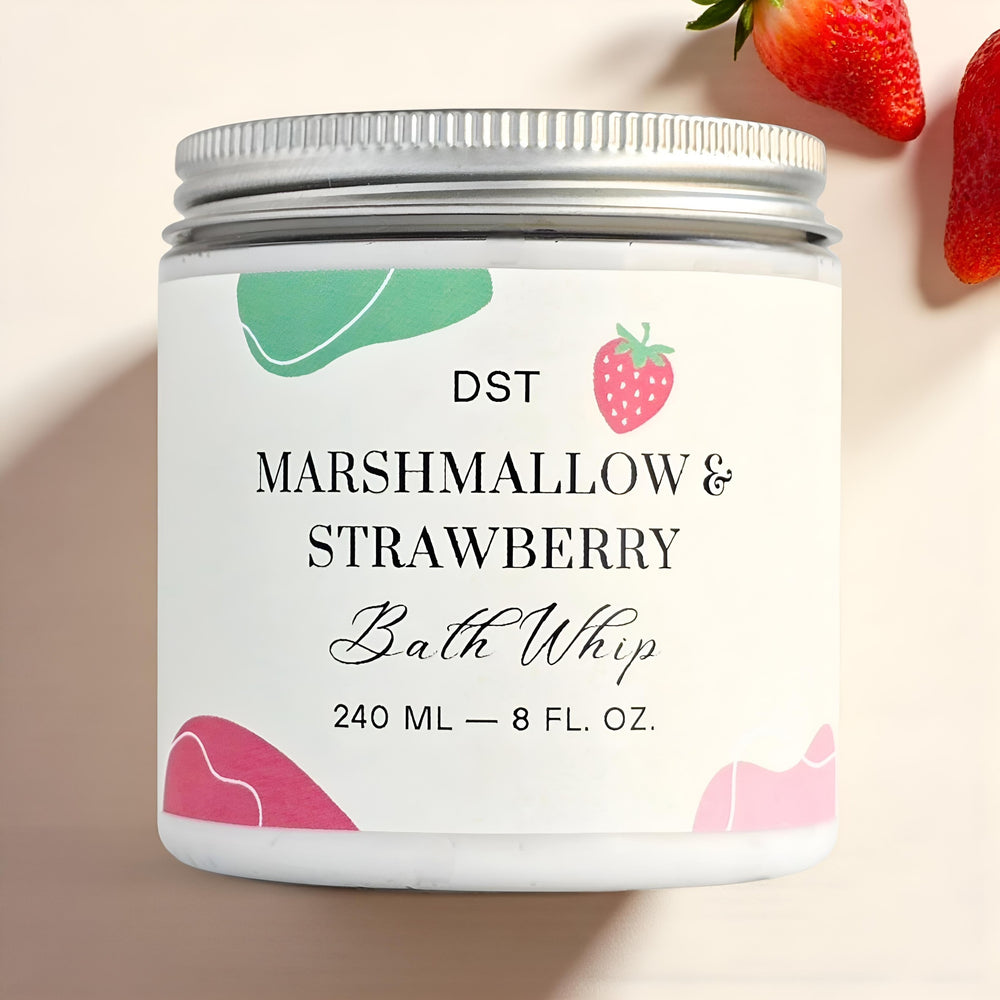 Jar of Marshmallow & Strawberry bath whip with strawberry illustrations on a beige background
