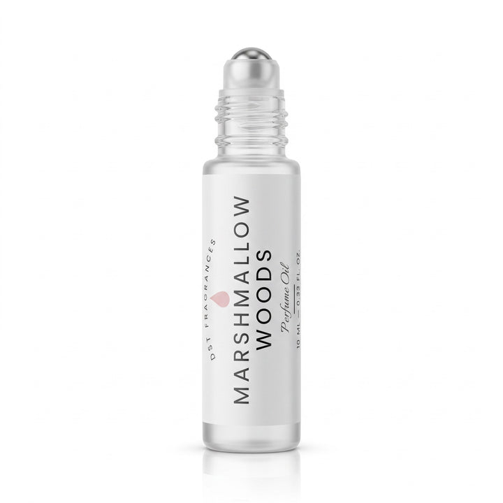 10ml bottle of Marshmallow Woods scented perfume oil roll on with top removed showing steel rollerball mechanism