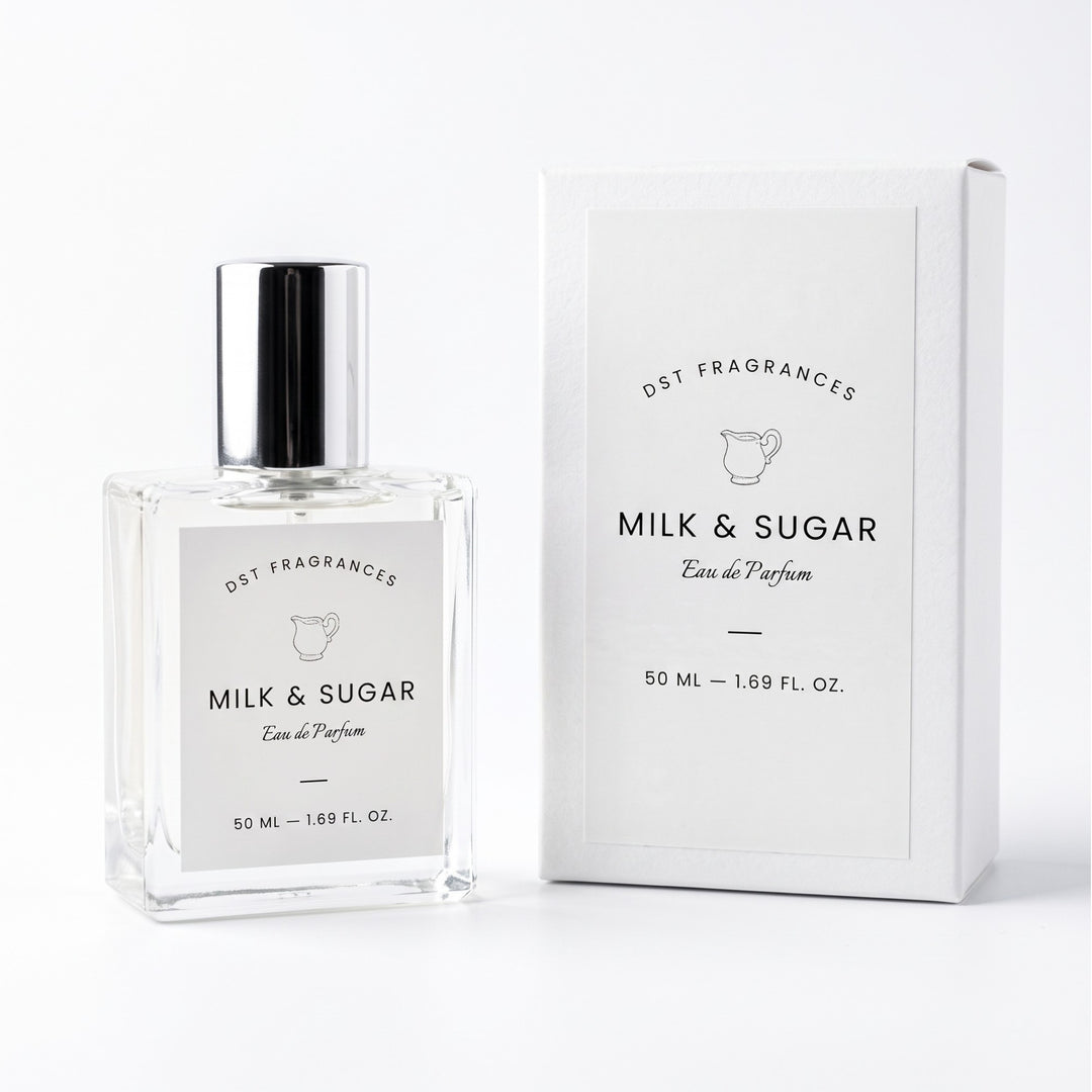 15ml spray bottle of Milk &amp; Sugar Eau de Parfum and its box packaging by DST Fragrances against a while background.
