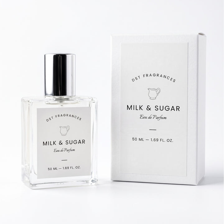 15ml spray bottle of Milk &amp; Sugar Eau de Parfum and its box packaging by DST Fragrances against a while background.