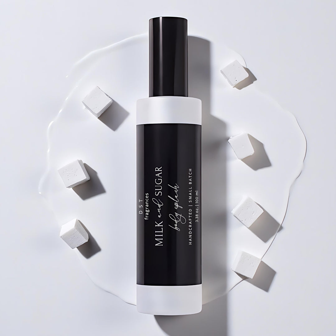 Black and white body splash bottle with 'Milk & Sugar' branding on a light gray background