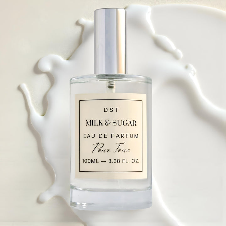 Milk Sugar Eau de Parfum bottle laying against spilled mi