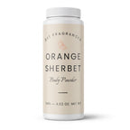 A white plastic bottle of DST Fragrances Orange Sherbet Body Powder with a cream-colored label, shown on a clean white background.