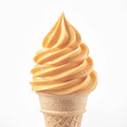A swirl of soft vanilla ice cream in a light brown waffle cone, centered on a clean white background.