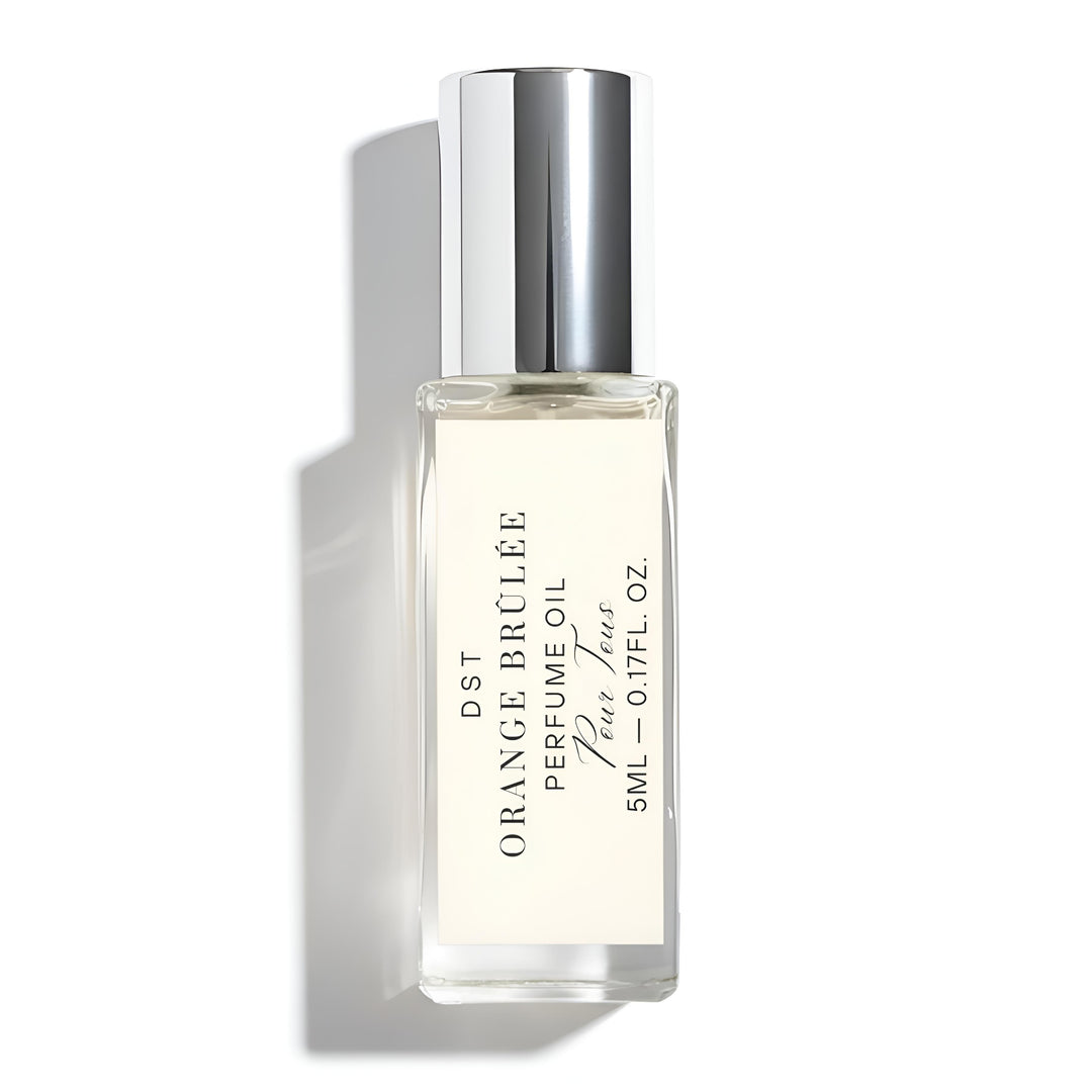 Perfume bottle labeled 'Orange Brélé' on a white background