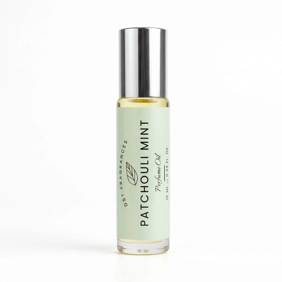 Patchouli Mint Perfume Oil in a clear glass roller bottle with a silver cap and a pale mint green label, shown on a white background.