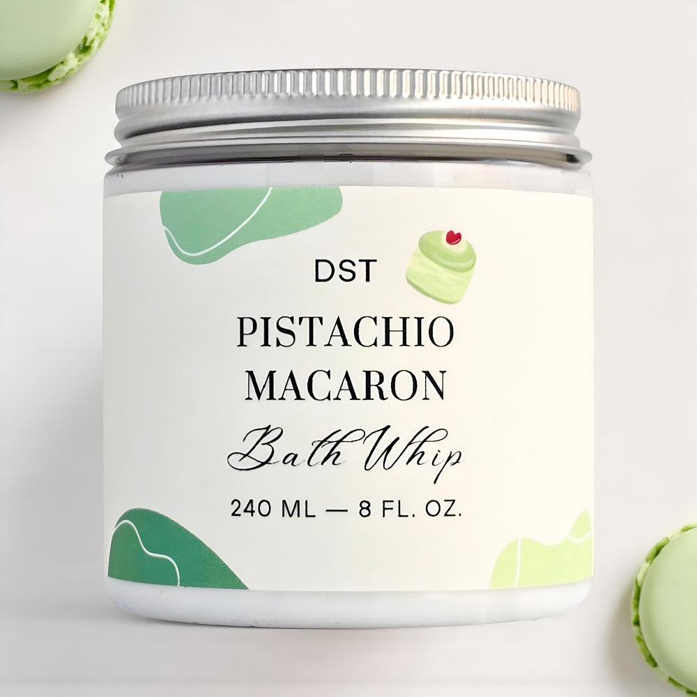 Pistachio macaron-themed bath whip container with decorative elements on a white background