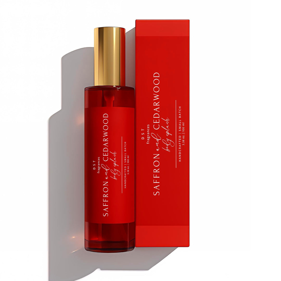 100ml bottle of Saffron & Cedarwood scented Room & Linen Spray and its box by DST Fragrances against a white background.