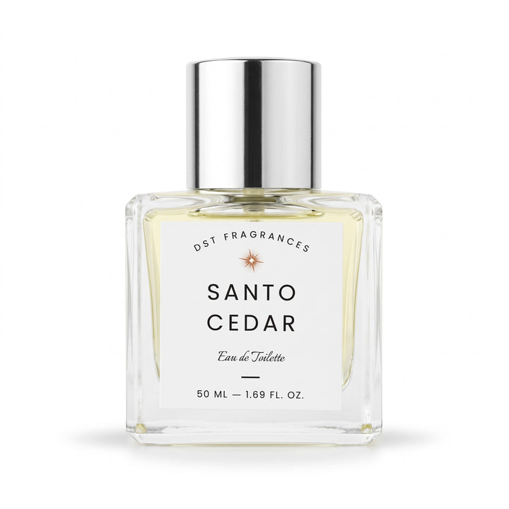 A 50 ml clear glass bottle of DST Fragrances Santo Cedar Eau de Toilette, featuring a white label and a reflective silver cap, set against a plain white background.