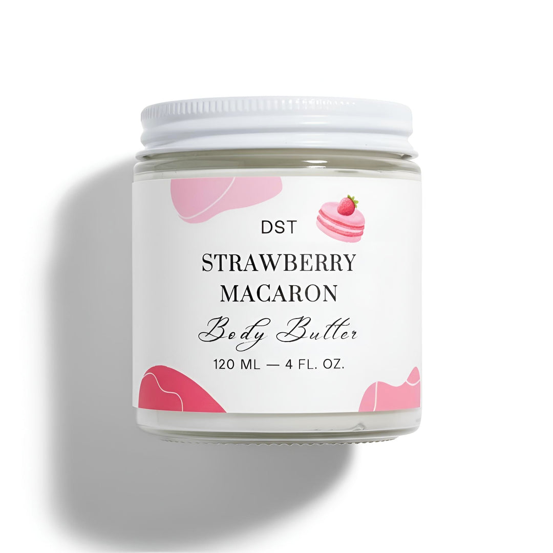 Jar of strawberry macaron body butter with a white label on a light gray background