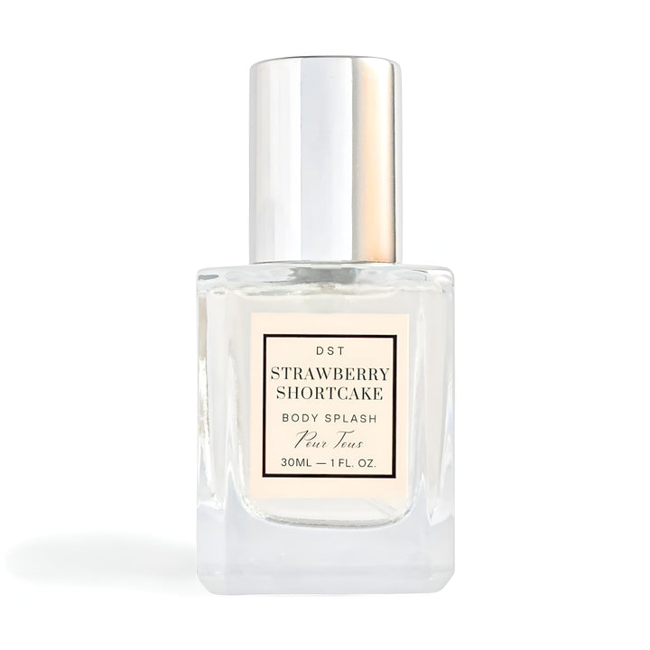 Clear bottle of Strawberry Shortcake body splash with a white label on a white background