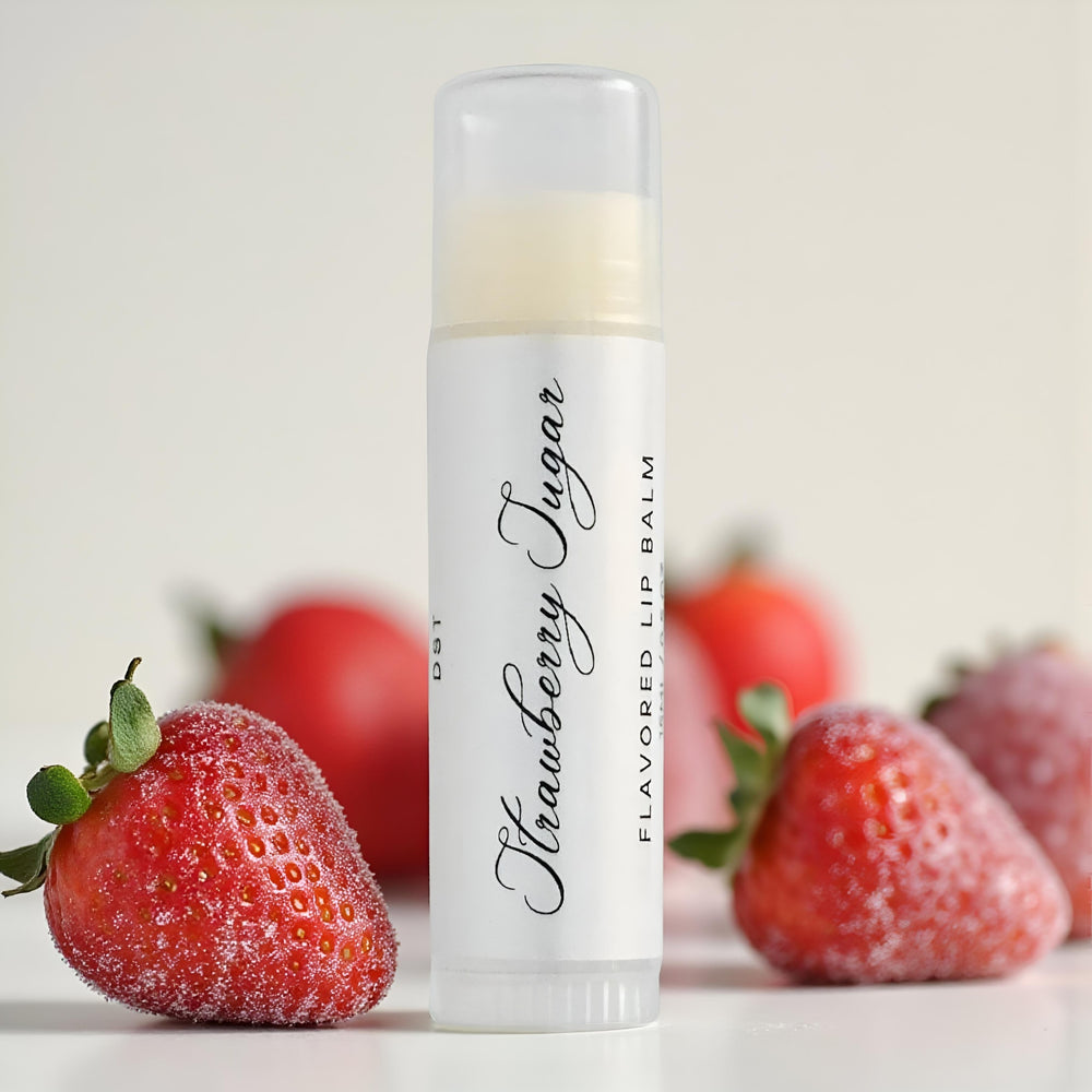 DST Fragrances Strawberry Sugar-flavored lip balm with strawberries on a light background