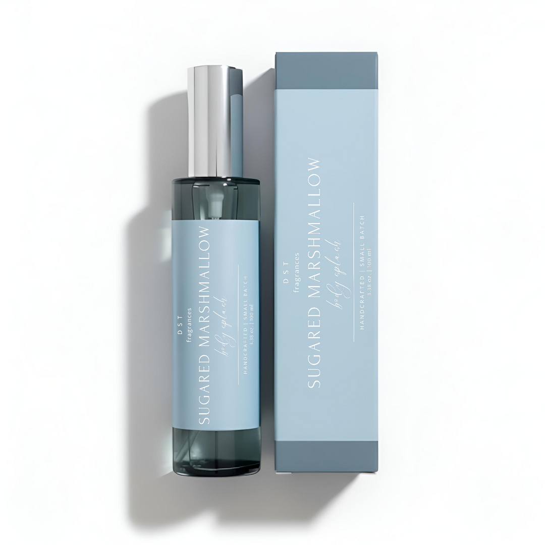 100ml bottle of Sugared Marshmallow Body splash and its box by DST Fragrances on a white background.