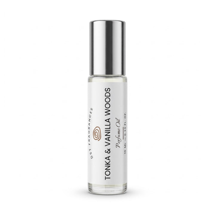 10ml roll on bottle of Tonka and Vanilla Woods Perfume Oil by DST Fragrances against a white background.