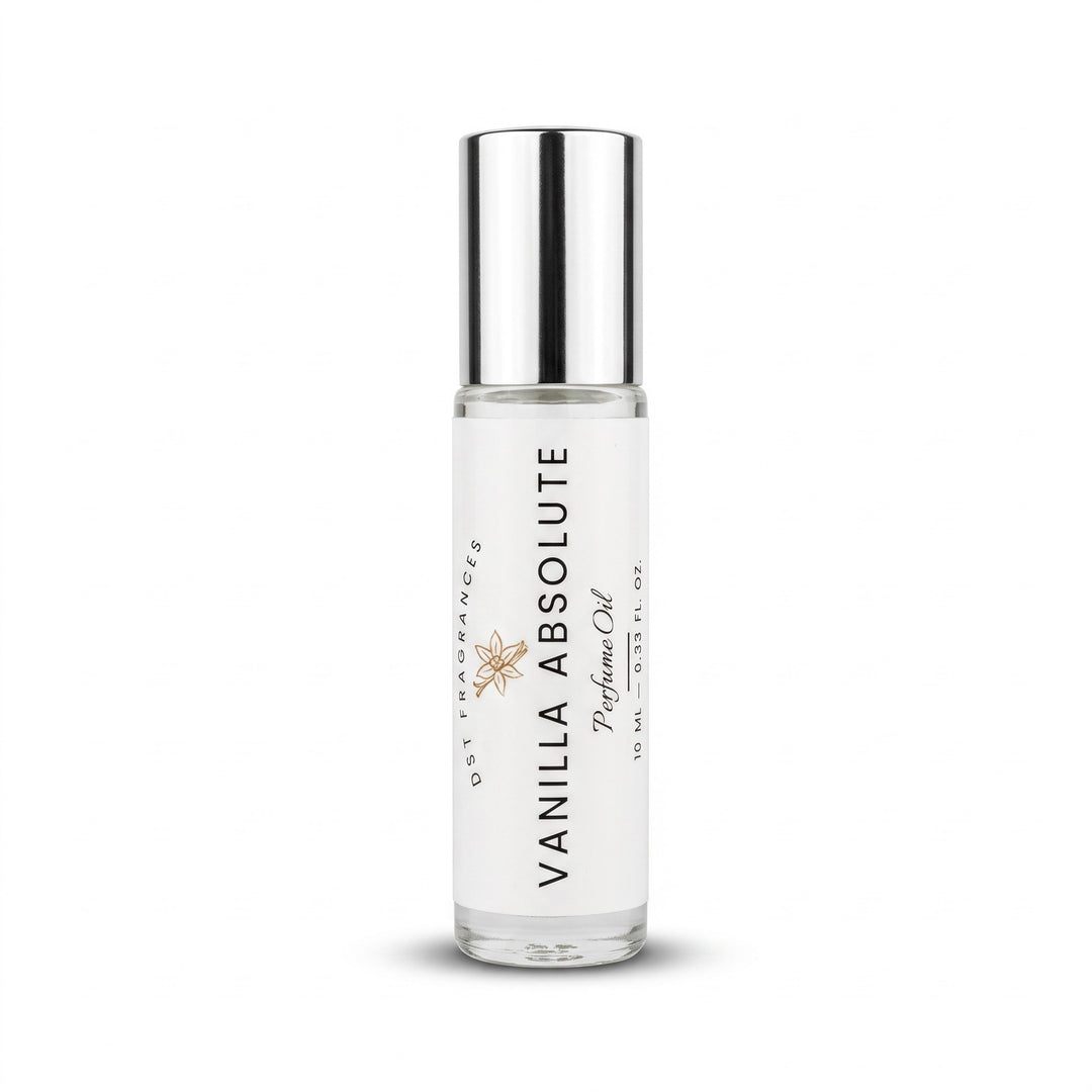 A 10 ml roll-on perfume oil bottle with a silver metallic cap and a white label reading &