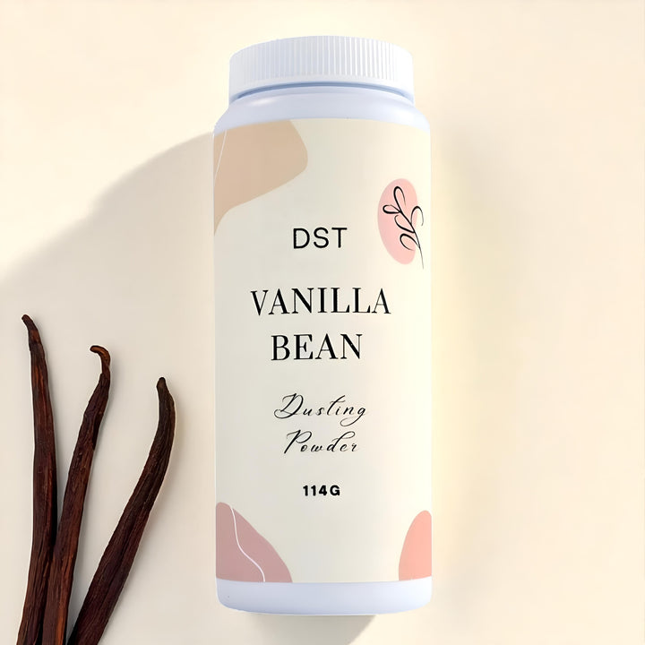 Vanilla bean dusting powder container with vanilla beans on a beige background